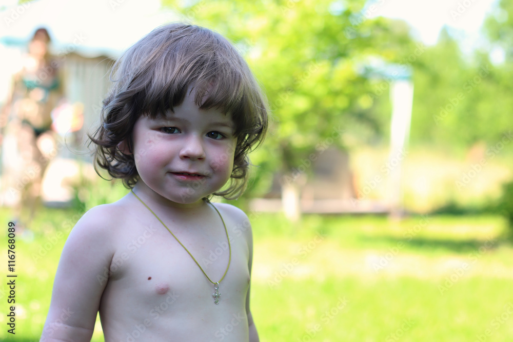 naked baby on nature