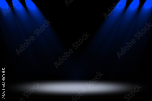 empty stage with blue spotlight background