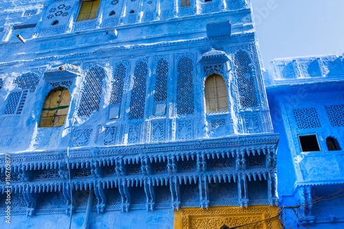 Traditional blue windows and wall in Blue City Jodhpur, India. photo