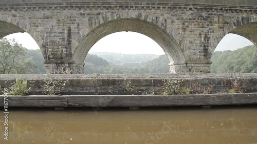 Scenic shot of the world famous Chirk Aqueduct built in 1801 by Thomas Telford. This impressive canal aqueduct has a bigger brother by the side for rail transportation. Located on the Llangollen Canal photo