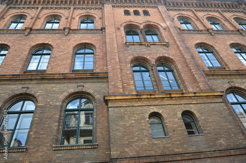 Old red brick building many windows