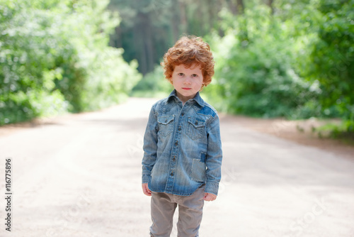cute little emotional boy outdoors © Aliaksei Lasevich