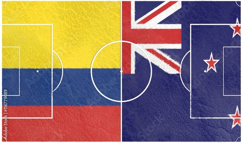 Flags of countries participating to the football tournament. Football field textured by Colombia and New Zealand national flags. 3D rendering