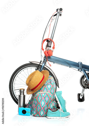 The new modern bicycle and suitcase, sneakers, thermos