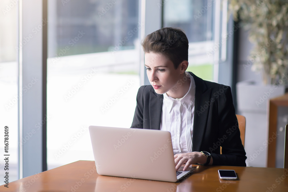 Young pretty business woman with notebook Young pretty business woman with notebook