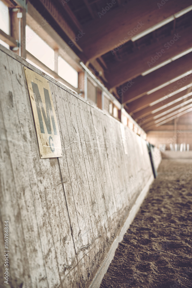 Wooden paneling at an indoor riding school