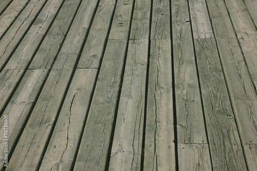A closeup on wooden planks creating a pattern.