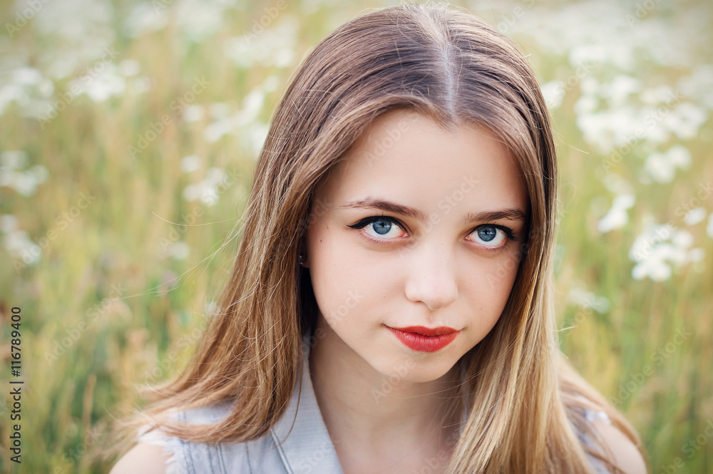 Portrait of a female teenager with blond hair and trendy make up Portrait of a female teenager with blond hair and trendy make up