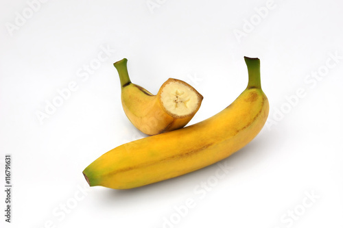 whole and sliced banana isolated on a white background