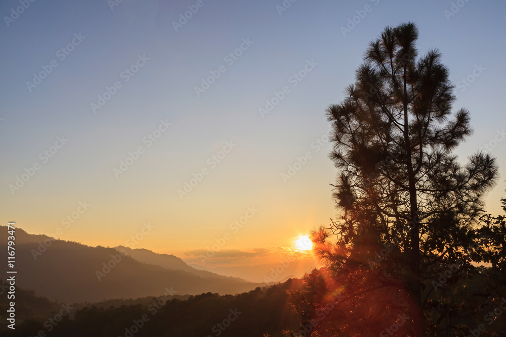 Beautiful sunset over big mountain background Beautiful sunset over big mountain background
