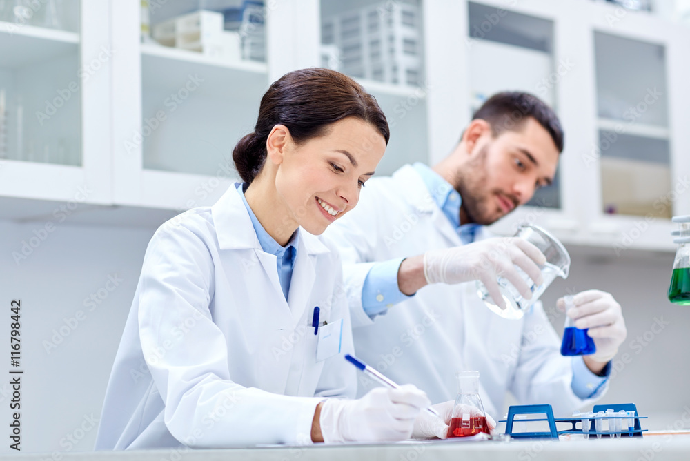 young scientists making test or research in lab young scientists making test or research in lab