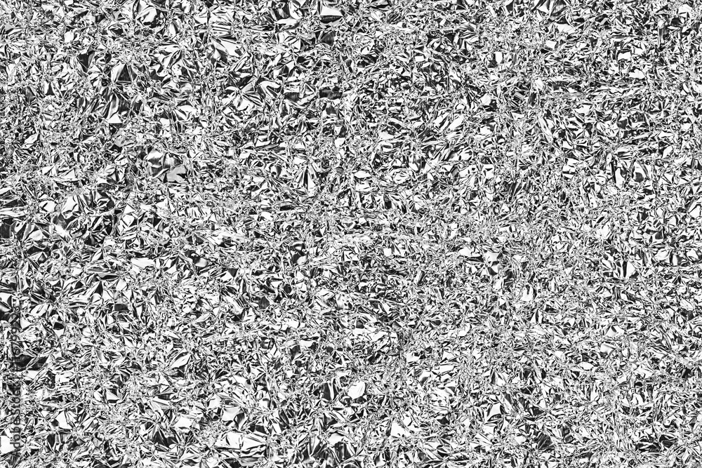 Shiny silver gray foil texture for background and shadow. Crease Shiny silver gray foil texture for background and shadow. Crease