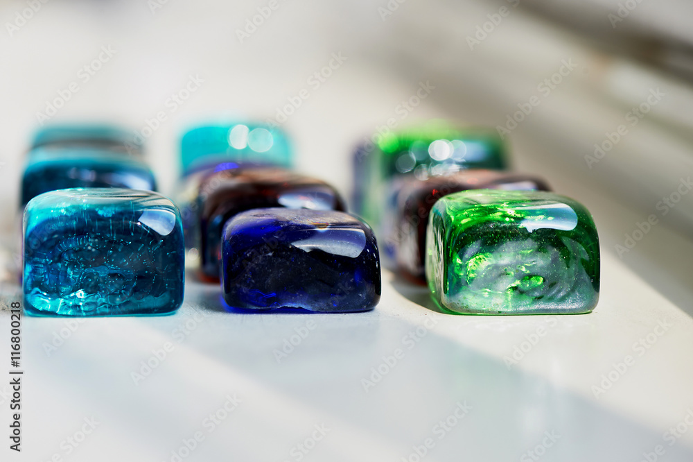Bright glass multicolored glass stones square. Macro Bright glass multicolored glass stones square. Macro