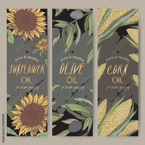 Three color sunflower, olive, corn oil labels on black.