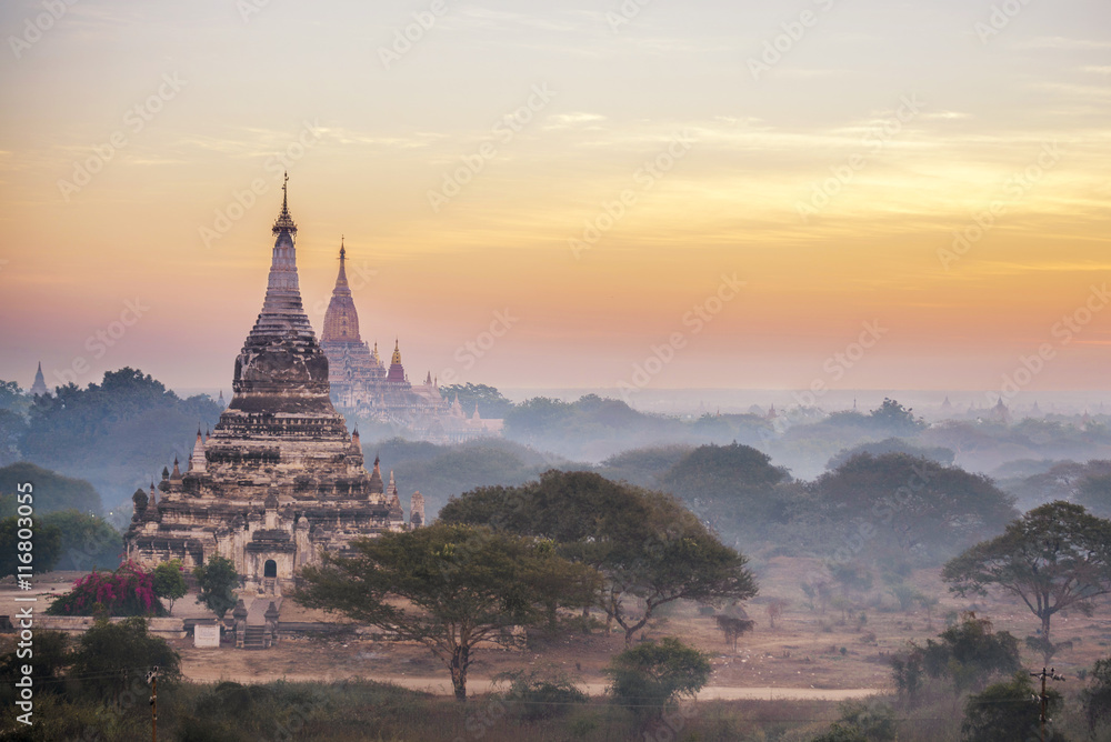 Beautiful sunrise scene at ancient pagoda in Bagan , Myanmar