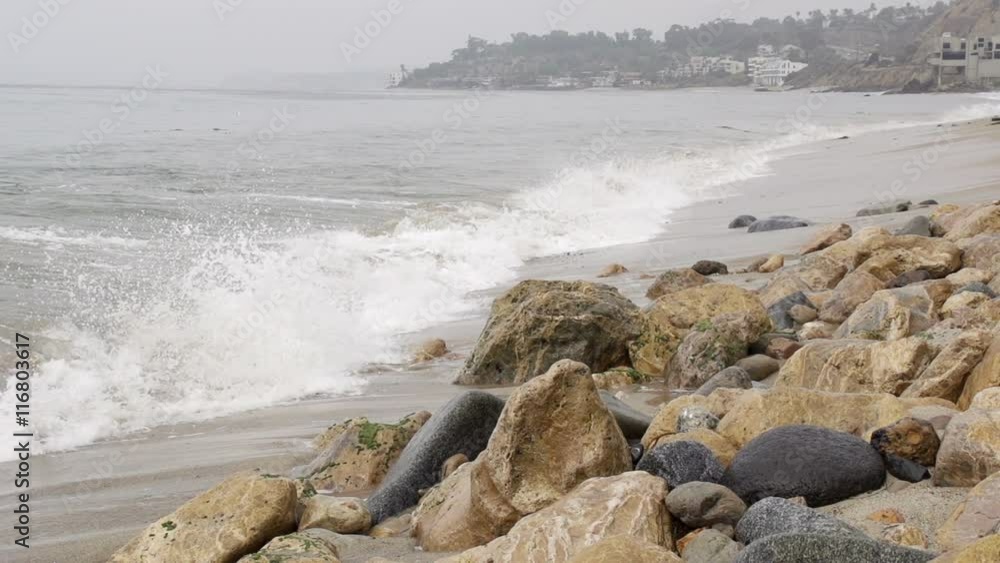 Ocean Waves crashing against a rocky shore. Shot with a high-speed camera. Ocean Waves crashing against a rocky shore. Shot with a high-speed camera.