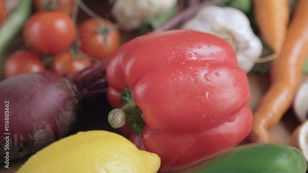 Red pepper with water drops on the table. Fresh vegetable mix Red pepper with water drops on the table. Fresh vegetable mix