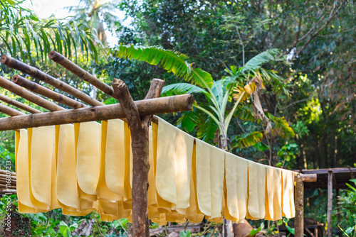 Dry rubber sheets process by the sun.
