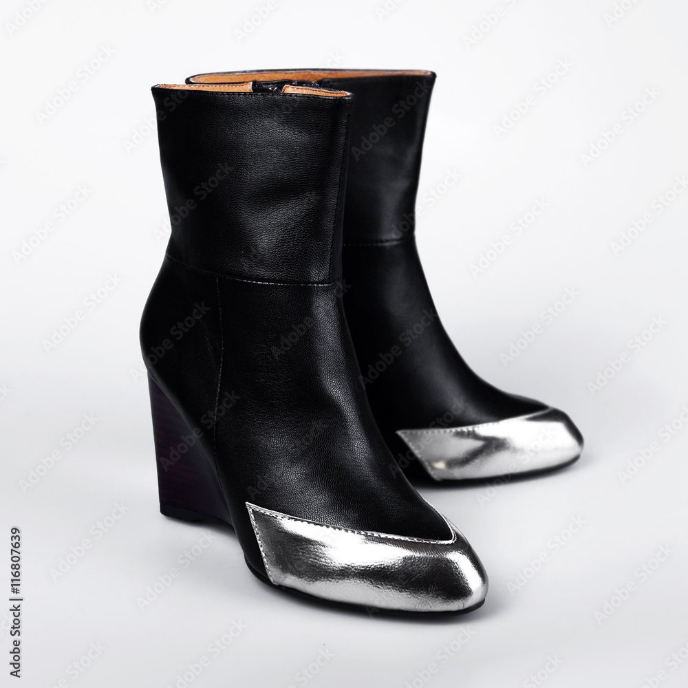 Black boot isolated on white background. Black boot isolated on white background.