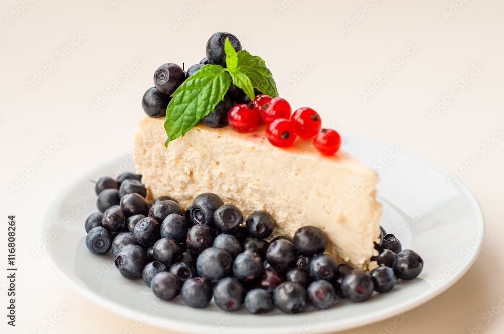 Cheesecake with blueberries and red currants Cheesecake with blueberries and red currants