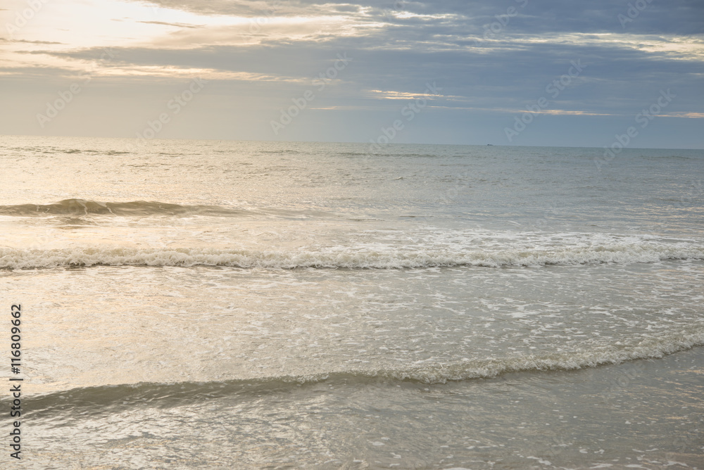 Fototapeta premium Turquoise sea wave foam on koh chavg beach, Trat, Thailand. Thailand sea beach with sea foam, white sand. Beautiful sea wave. Sea waves. Colorful sea. Sea waves near beach. Beautiful sea beach.