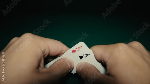 A pair of aces in a hand on the table. Pocker
