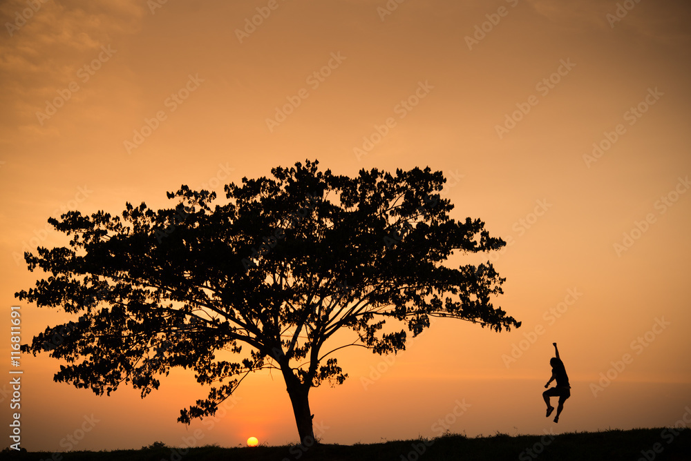 silhouette of man overjoy jump at sunrise