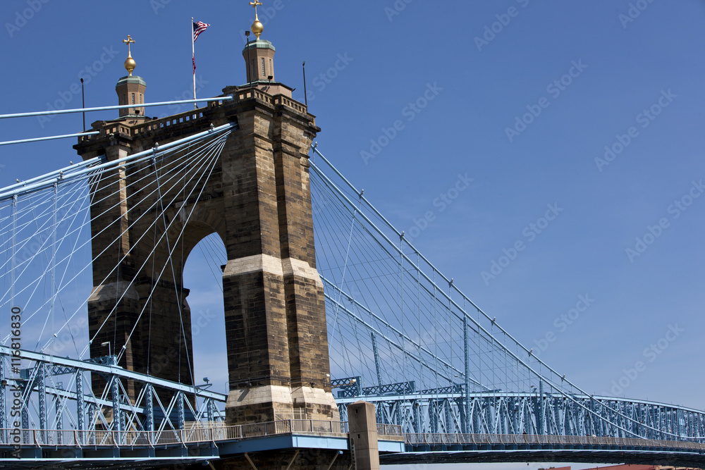 The John A. Roebling Bridge connects Cincinnati, Ohio and Covington, Kentucky over the Ohio river.