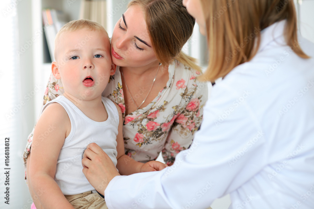 Doctor examining a child patient by stethoscope Doctor examining a child patient by stethoscope