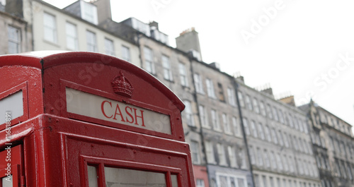 Top of the British Phone Booth with writing 