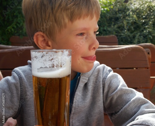 Little boy and non-alkoholic beer