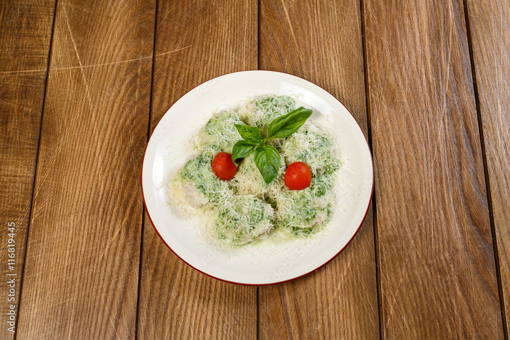 A beautiful seafood dish on a wooden background A beautiful seafood dish on a wooden background