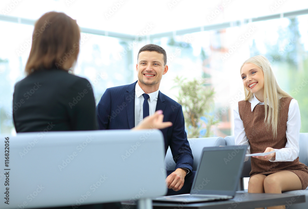 Business team discussing together plans Business team discussing together plans