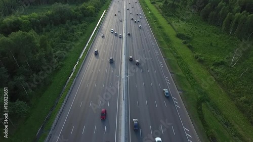 Aerial View of Traffic on a Motorway Ring Road Through a Wooded Area