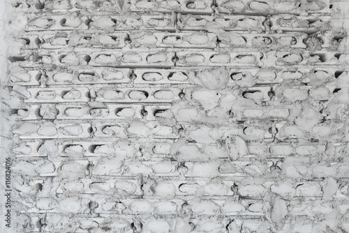 Fotografija uncompleted grey concrete brick wall
