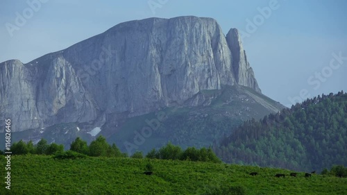 Caucasus mountain with moving clouds in nature park Big Thach photo