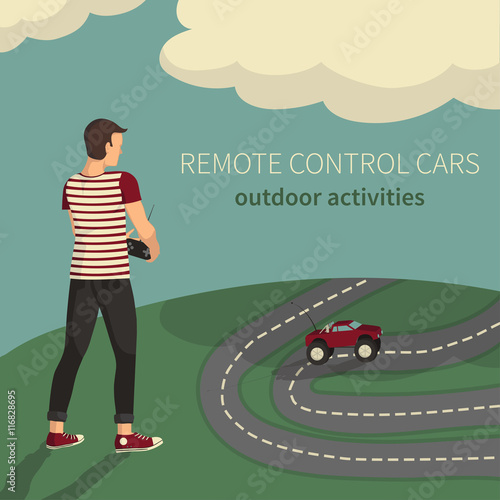 Boy, managing cars on the radio control.