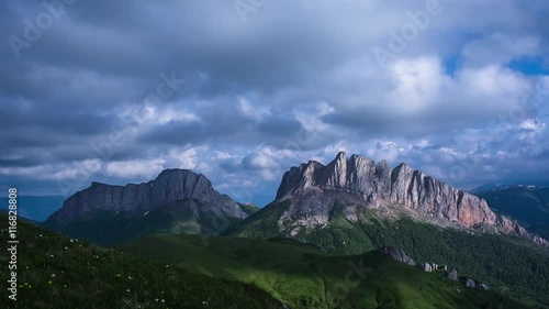 Caucasus mountain with moving clouds in nature park Big Thach photo