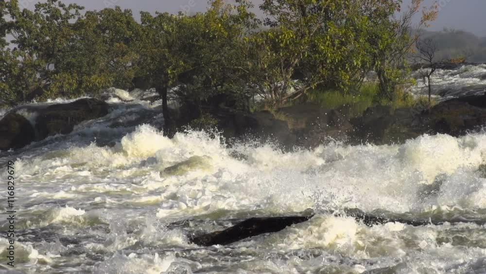 Slow motion of the beautiful Victoria Falls on the border of Zambia and Zimbabwe. Slow motion of the beautiful Victoria Falls on the border of Zambia and Zimbabwe.