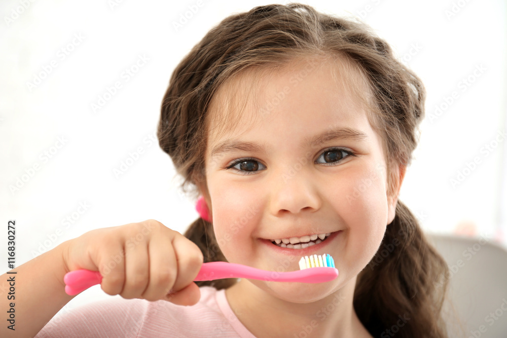 Cute little girl with toothbrush, close up Cute little girl with toothbrush, close up