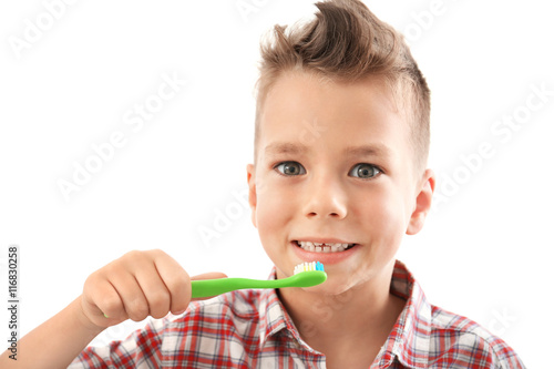 Cute boy with toothbrush isolated on white