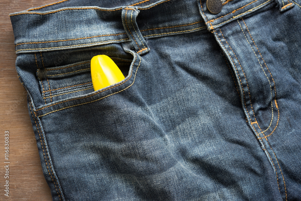 Big Banana like the penis in men's jeans,top view, on wooden background  Stock Photo | Adobe Stock