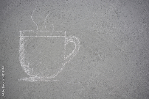 Drawing picture a cup of beverage on concrete wall