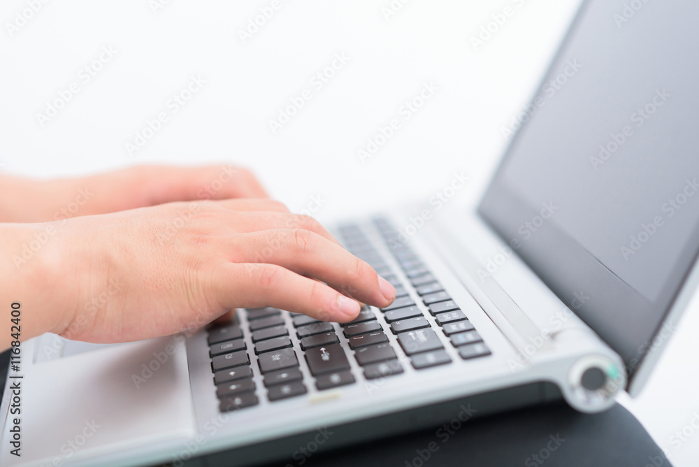 Hands typing on keyboard of laptop. Hands typing on keyboard of laptop.