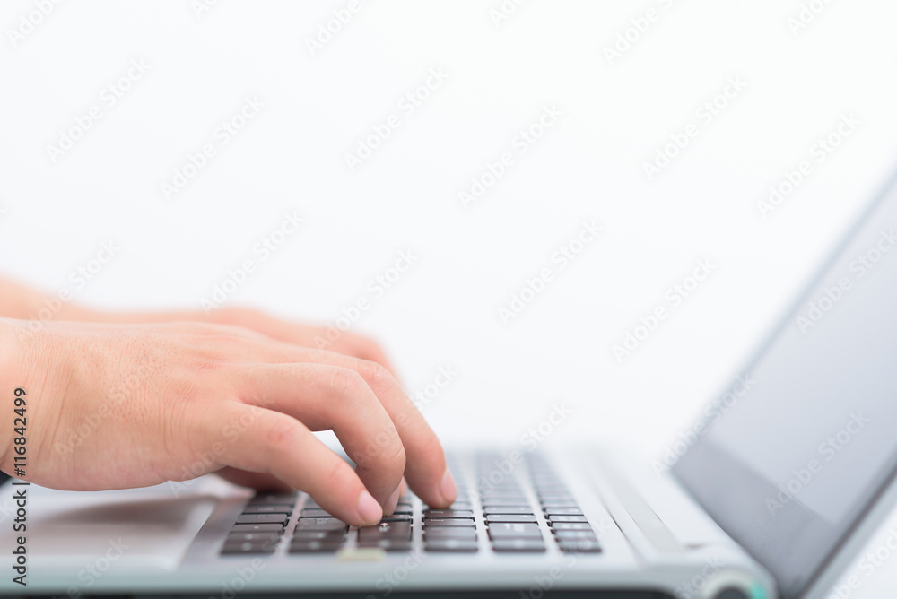 Hands typing on keyboard of laptop. Hands typing on keyboard of laptop.