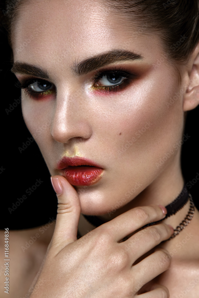 Beautiful woman portrait with glamour make up and jewelry on neck on black background. Beautiful woman portrait with glamour make up and jewelry on neck on black background.