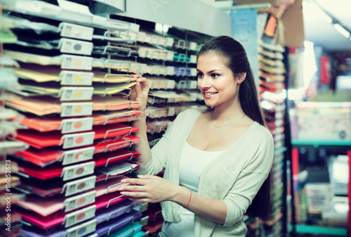 woman shopping multicolored paper
