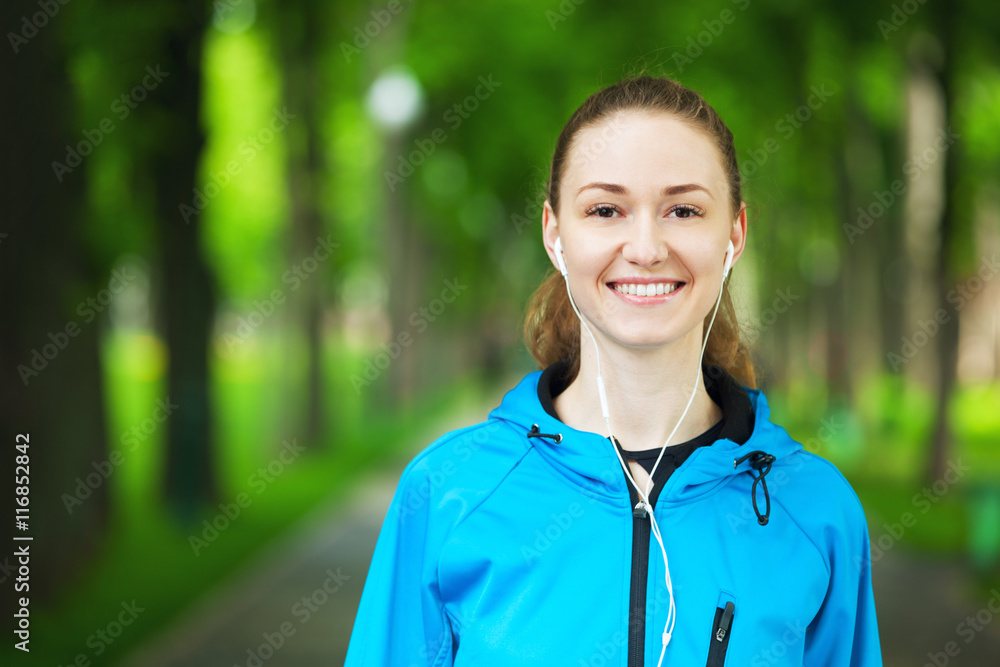 Cheerful young woman ready to start her morning workout. Cheerful young woman ready to start her morning workout.