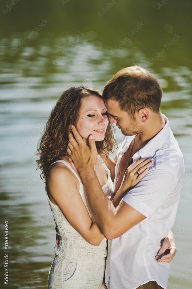 A tender embrace on the shore of the wooded lake 6328. A tender embrace on the shore of the wooded lake 6328.