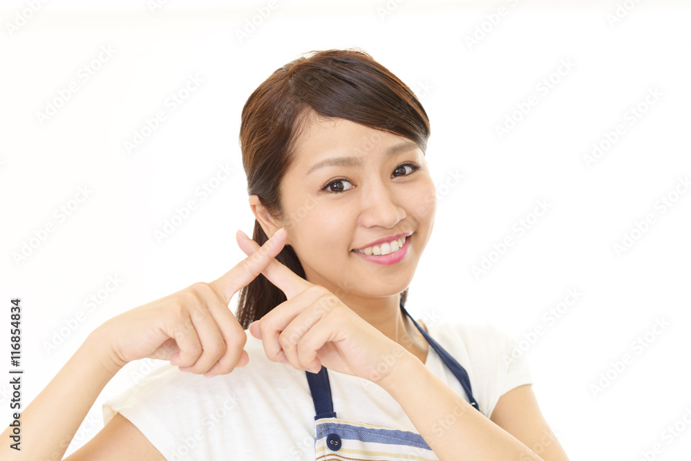 禁止の意思表示をする主婦
